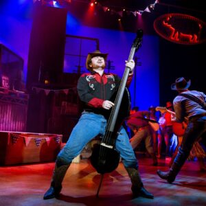 Scott Haining as Bickie and the cast of Footloose. Photo Credit Matt Martin